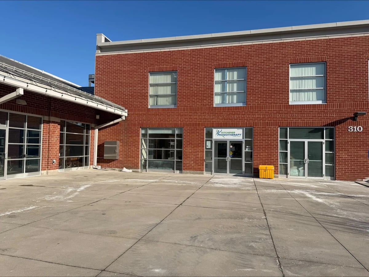 The clinic entrance at 310 King Street East, unit 203, beside the Kitchener Market