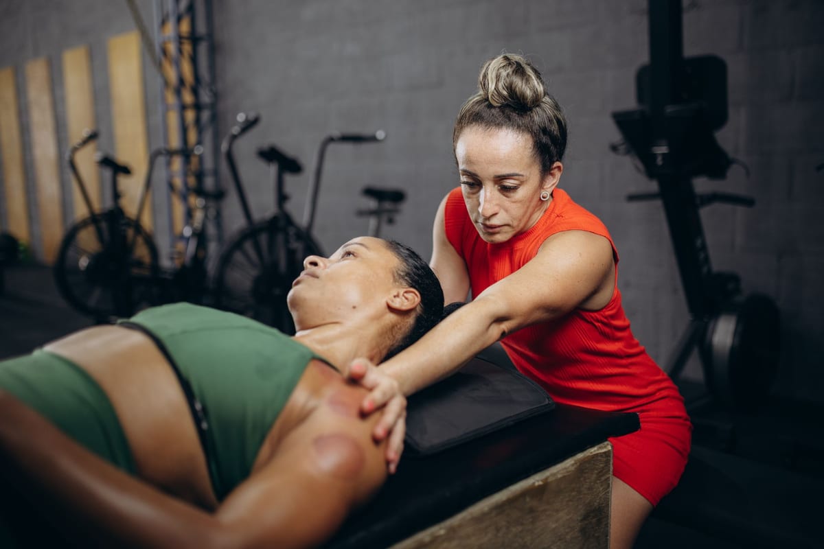 A sports therapy stretch on a treatment bench